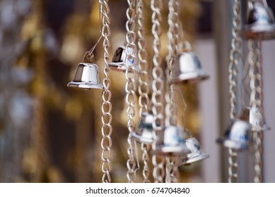 Chaiyaphum, Thailand - July, 02, 2017 : A small bell to bless the gods for good luck in Wat Phra That Chaiyaphum Temple at Chaiyaphum, Thailand