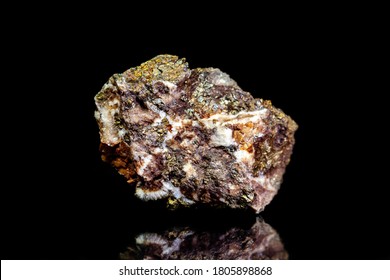 Chalcopyrite copper ore, raw rock on black background, mining and geology, mineralogy - Shutterstock ID 1805898868