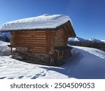 Chalet on the Alps with snow