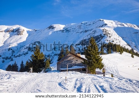 The chalets in the Mont Blanc massif Between Mont Joly and Aiguille Croche in Europe, France, Rhone Alpes, Savoie, Alps, in winter, on a sunny day.