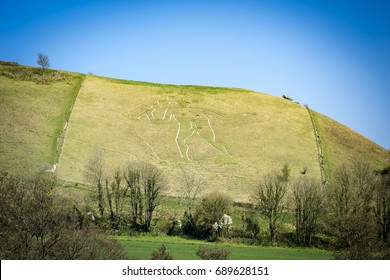 Chalk figure of the Cerne Abbas Giant in Dorset - Shutterstock ID 689628151