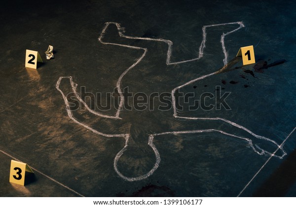 chalk outline\
and evidence markers at crime\
scene