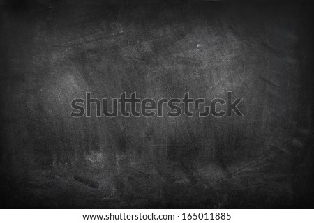 Chalk rubbed out on blackboard 
