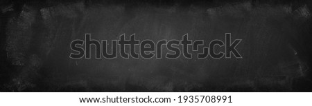 Chalk rubbed out on blackboard background