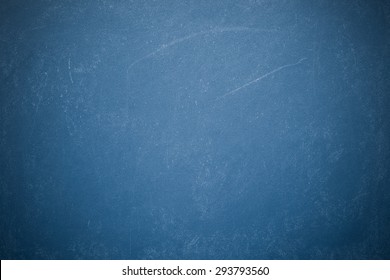 Chalk rubbed out on blueboard - Powered by Shutterstock