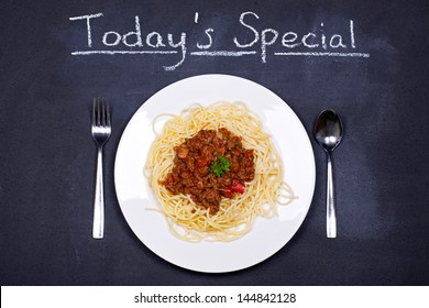 Chalkboard Advertising The Daily Special Of Spaghetti Bolognese