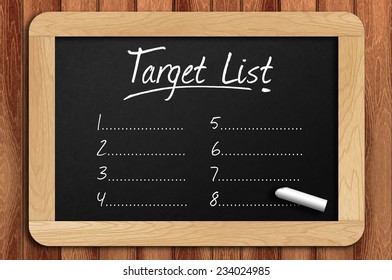Chalkboard On The Wooden Table Written Target List.