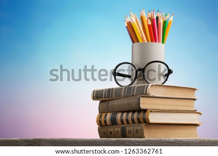 Chalkboard with stack book