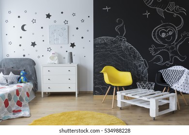 Chalkboard Wall With Creative Drawings In Kid's Bedroom