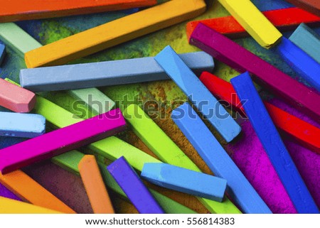 Chalks pastel and pastel background.