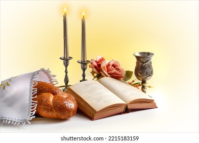 Challah Bread Covered With A Special Napkin, Shabbat Wine, Torah And Candles On White Background. Traditional Jewish Shabbat Ritual. Shabbat Shalom.