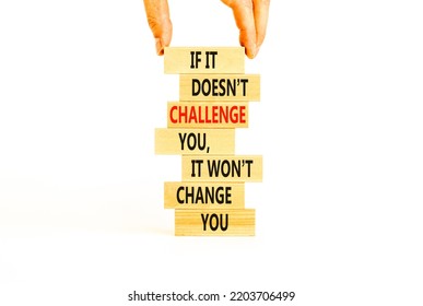 Challenge To Change Symbol. Concept Words If It Does Not Challenge You It Wont Change You On Blocks On A Beautiful White Background. Businessman Hand. Business Motivational And Challenge Concept.