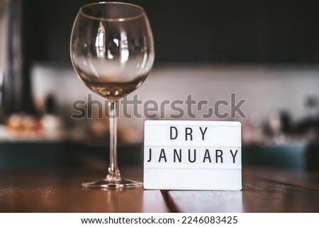 Challenge dry January. Wine glass with water. Non-alcoholic month. Concept of healthy lifestyle. In new year without alcohol. 31 days of abstinence from alcohol
