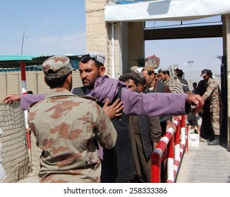 CHAMAN, PAKISTAN - MAR 06: Pakistan Security Forces Staffs Searching Afghan Nationals Entering Into Pakistan Via Chaman Boarder, On March 06, 2015 In Chaman. 
