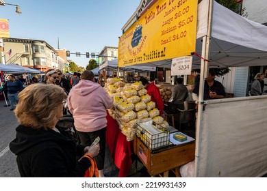 Chambersburg Pennsylvania USA 10-15-2022 Women Buying Kettle Pop Corn At Outdoor Street Fair