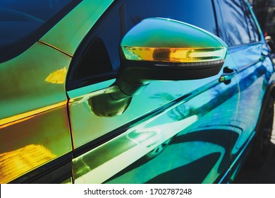 Chameleon Holographic Colour Car. Side View. Driver's Door And Side Mirror. Closeup. Car Wrapping. Car Exhibition.