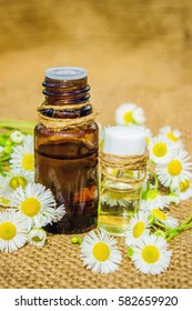 Chamomile Extract In A Small Jar. Selective Focus. 