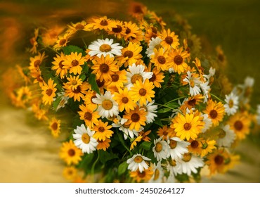 Chamomile flowers. A large bouquet of yellow and white daisies on a colored background close-up. Art photography - Powered by Shutterstock