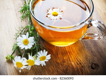 chamomile tea on wooden table