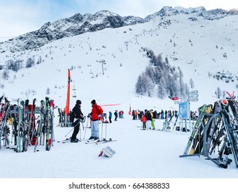 Chamonix, France - January 24, 2015: People Skiing, Pile Of Skis And Slopes View At Les Grands Montets Ski Area Near Chamonix, France