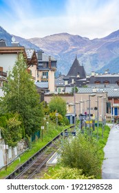 Chamonix Mont-Blanc, France - October 4, 2019: Autumn view and railroad of famous ski resort in French Alps - Shutterstock ID 1921298528