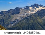 Chamonix mountain valley in the alps with the Mont Blanc Massif in the background