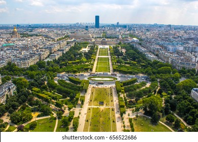Champ de Mars view from top of eiffel tower looking down see the entire city as a beautiful classic architecture. A romantic place for lovers and family to visit. 