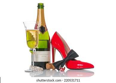 Champagne And Black Tie With Red Shoes And Accessories Isolated On A White Background.