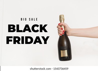 Champagne bottle on a white background. Black friday sale background 