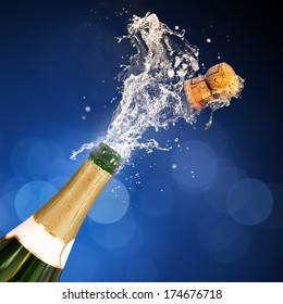 A Champagne Bottle Popping Open. Celebrations.