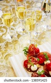 Champagne And Canapes On Table Close-up