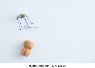 Champagne Cork And Metal Screed For Bottle Myzle. On A White Background. View From Above.