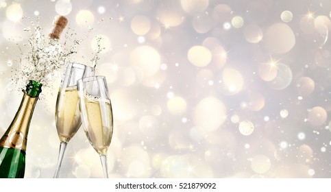 Champagne Explosion With Toast Of Flutes
				