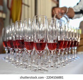 Champagne Flutes On A Table At A Wedding Banquet For The Preparation Of Kir Royal