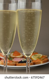 Champagne Glass And Canapes