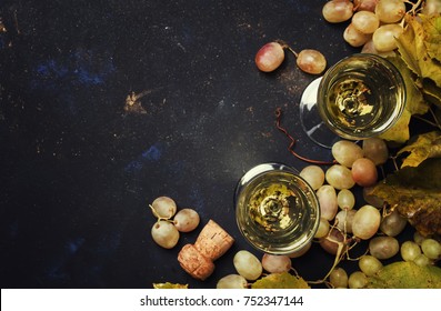Champagne In Glasses, Grapes With Vine, Black Background, Top View