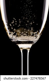 Champagne glasses isolated on black background