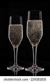 Champagne Glasses Isolated On Black Background