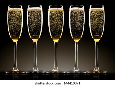 Champagne Glasses Set On Black Background