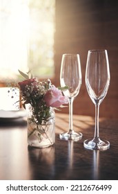 Champagne, Luxury Toast And Glass For Alcohol Wine Drink In Party, Birthday Celebration Or Anniversary Success. Texture, Pink Roses And Cocktail Glasses With House Kitchen, Home Or Restaurant Flowers