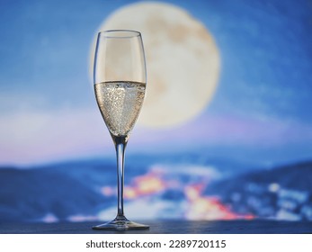 Champagne, moonlit cityscape, romantic ambiance - Powered by Shutterstock