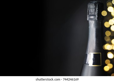 Champagne on the black background