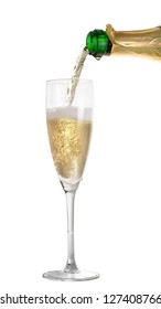 Champagne pouring into a glass on a white background