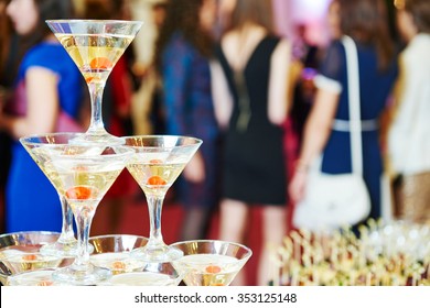 Champagne pyramid with waitress on event, party or wedding banquet reception