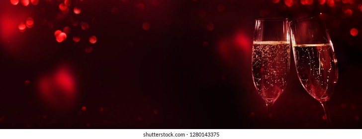 Champagne With Red Bokeh And Hearts On Dark Background For Valentines Day