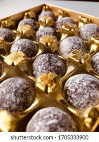 Champagne Truffles In A Plastic Gold Tray