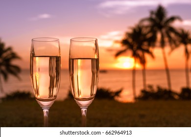 Champaign drinks and a beautiful beach sunset. 