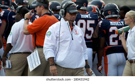 CHAMPAIGN,IL-SEPTEMBER 28: University Of Illinois Football Coach Tim Beckman Paces Back And Forth In Front Of The Illini Bench During A Game Against Miami-OH On Saturday, Sept 28, 2013.