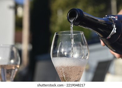 Champange Being Poured Into Glass