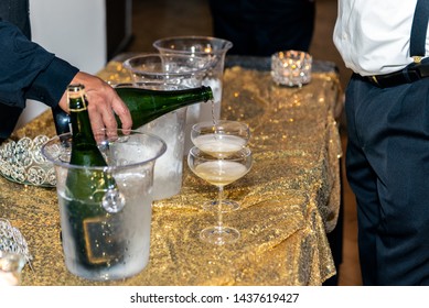 Champange Poured Into Glass Flute Arranged On Table And Ready For Party Goer To Drink Delicious Spirit..